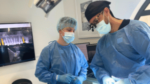 Michael Rowland and Morgan treating a patient at North Down Dental, Bangor, Northern Ireland.